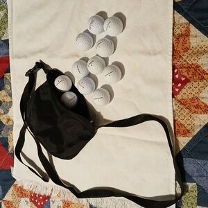 11 Golf balls Plus carry bag all new never used assorted brands